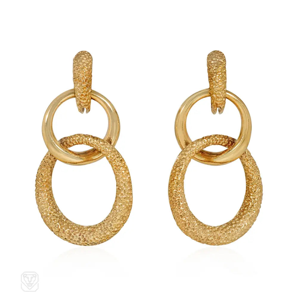 Ladies fine jewelry earrings-Van Cleef & Arpels doorknocker hoop earrings