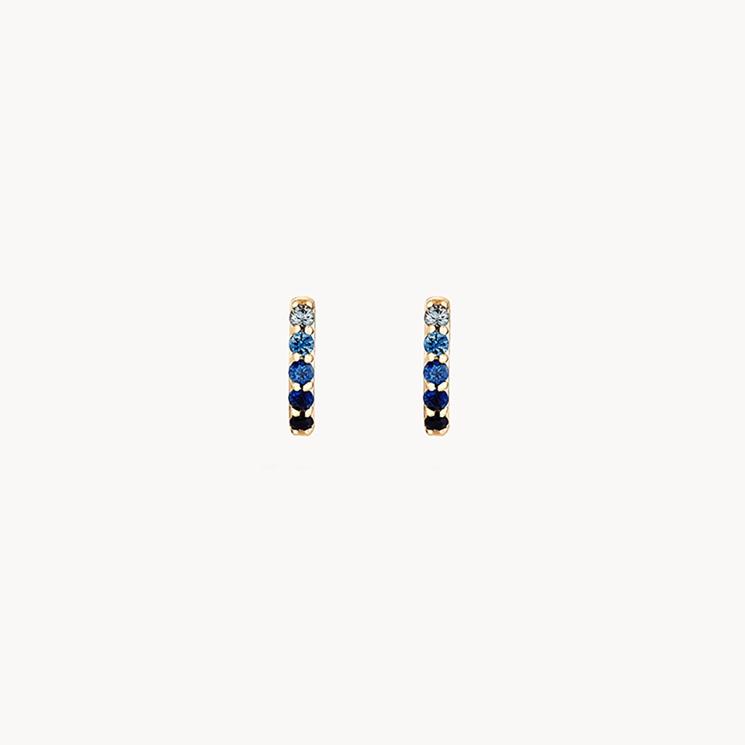 Ladies retro earrings-Endless ocean blue sapphire huggie earring - 14k yellow gold, blue sapphire