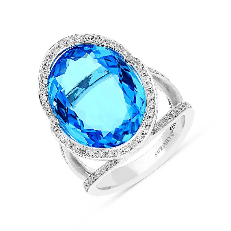 Ladies statement gemstone rings-Oval Cut Blue Topaz Cocktail Ring - 22.26 Carat